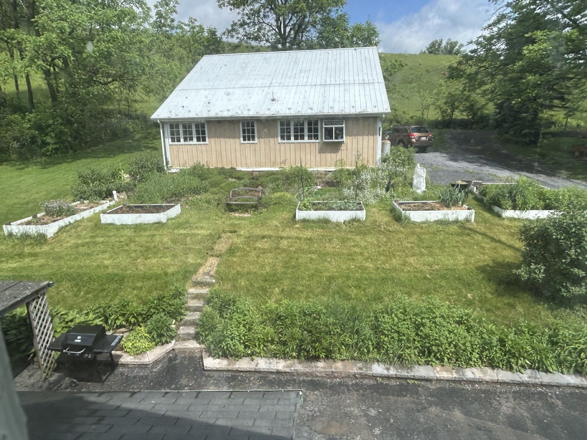 View of Driveway, Yard, and Apartment 